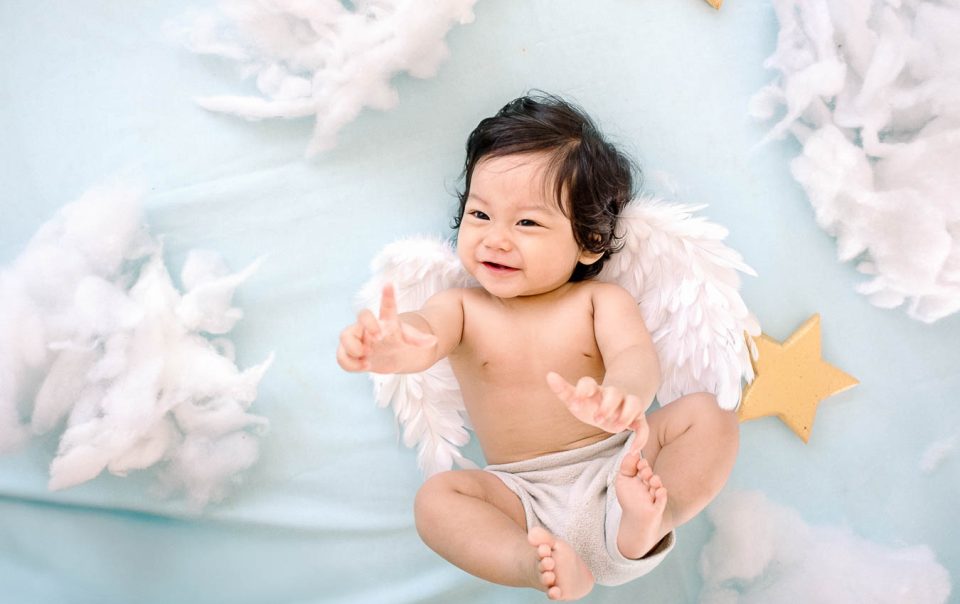 Baby Arka portrait with angel wings in Bali photography studio