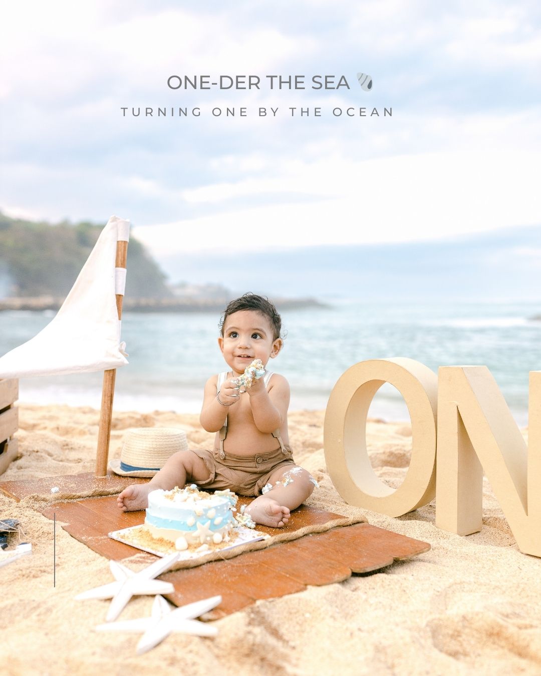 sailor cake smash bali baby photoshoot at nusa dua beach